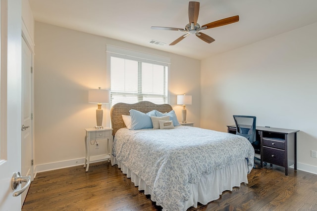 bedroom featuring dark hardwood / wood-style floors and ceiling fan