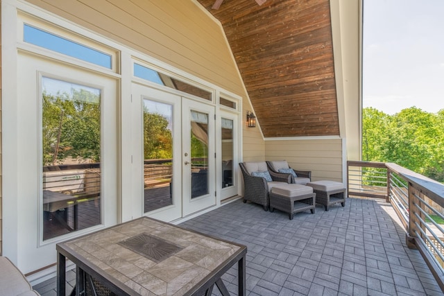 view of patio featuring ceiling fan and french doors