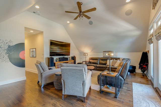 living room featuring dark hardwood / wood-style flooring, lofted ceiling, and ceiling fan