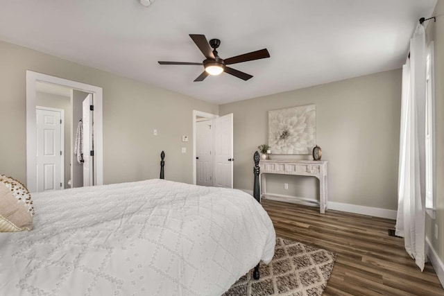 bedroom featuring ceiling fan and dark hardwood / wood-style floors