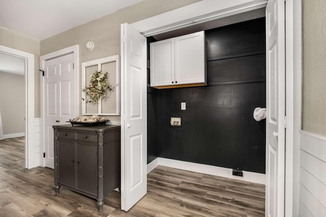 kitchen featuring white cabinetry and hardwood / wood-style floors