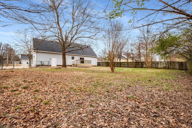 view of yard with a deck