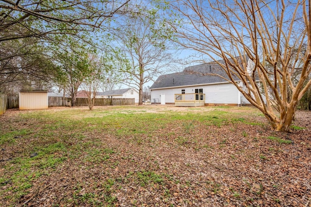 view of yard featuring a deck