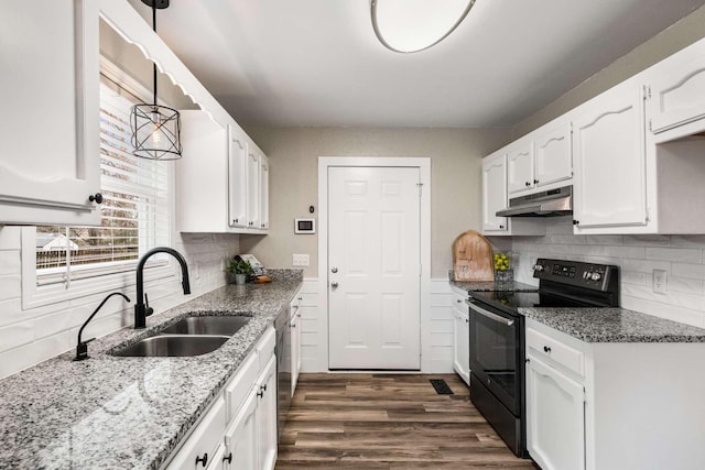 kitchen featuring dark hardwood / wood-style floors, decorative light fixtures, sink, white cabinets, and electric range