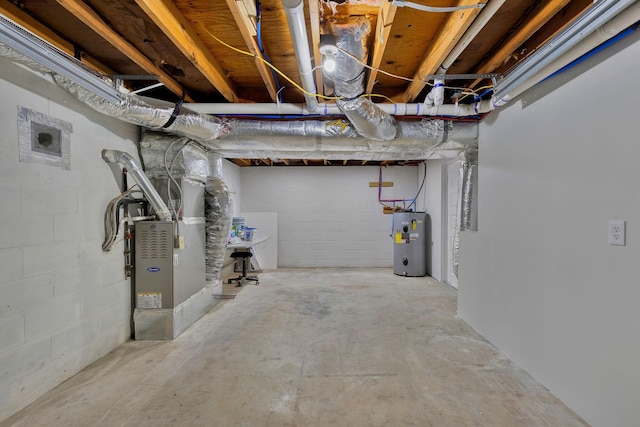 basement with electric water heater and heating unit