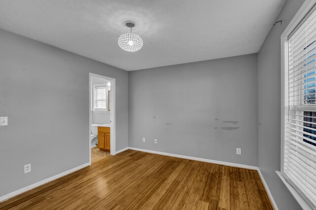 spare room featuring light hardwood / wood-style flooring