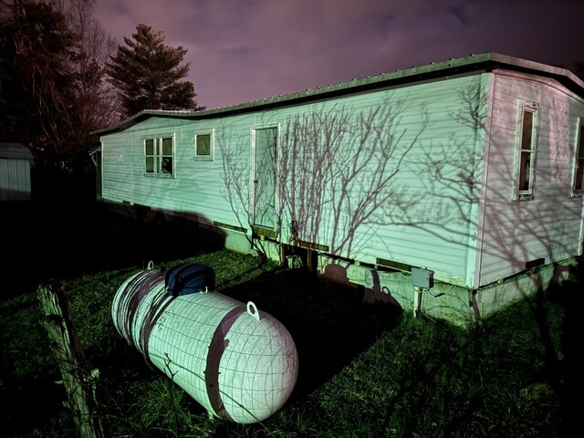 view of property exterior at dusk