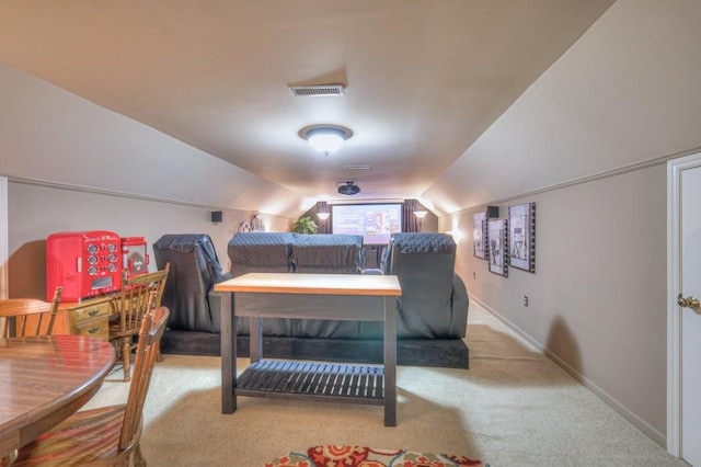 carpeted bedroom featuring vaulted ceiling