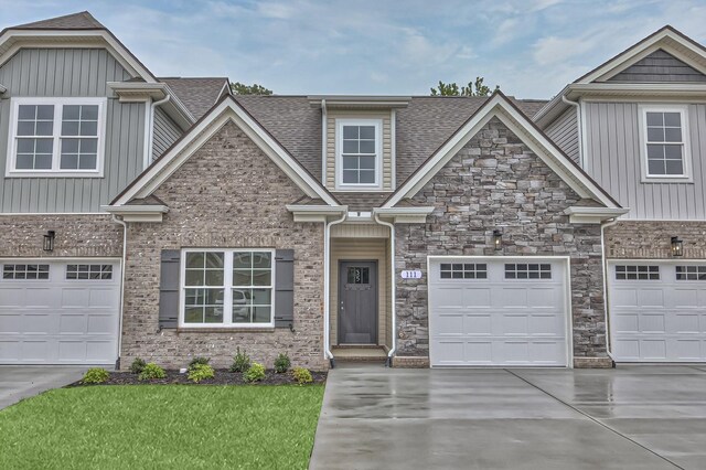 craftsman house with a garage