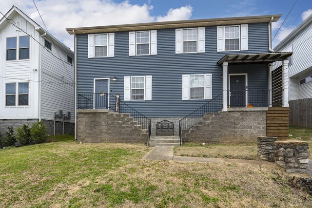 view of front of house with a front yard