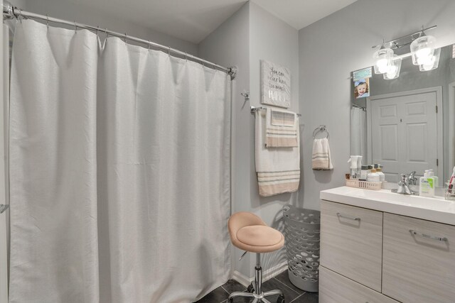 bathroom with vanity, tile patterned floors, and a shower with shower curtain