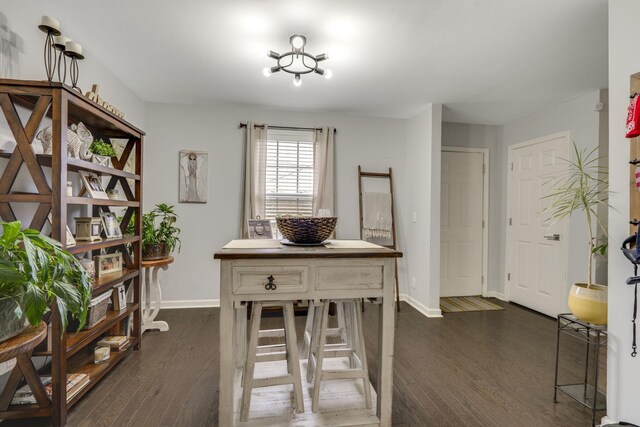 dining room featuring dark hardwood / wood-style floors