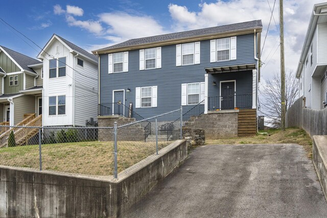 view of front of house featuring a front lawn