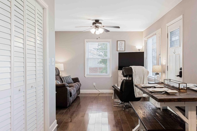 office featuring dark wood-type flooring and ceiling fan