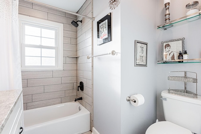 full bathroom with vanity, shower / bath combo, and toilet