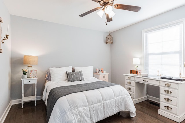 bedroom featuring dark wood-type flooring and ceiling fan