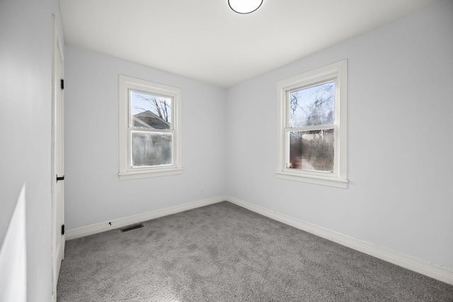 empty room with carpet floors