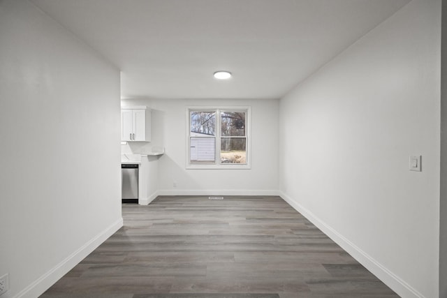 unfurnished dining area with light hardwood / wood-style flooring