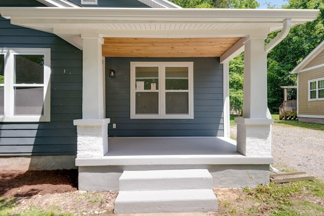 entrance to property with covered porch