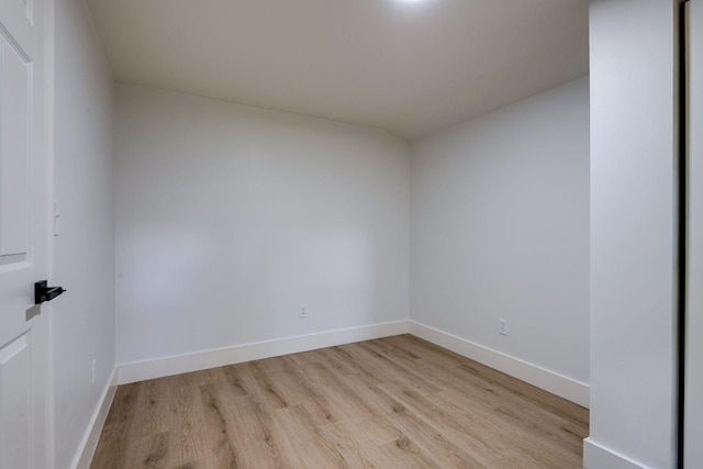 spare room featuring light hardwood / wood-style flooring