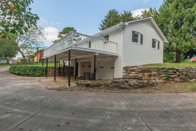 view of side of property with a deck