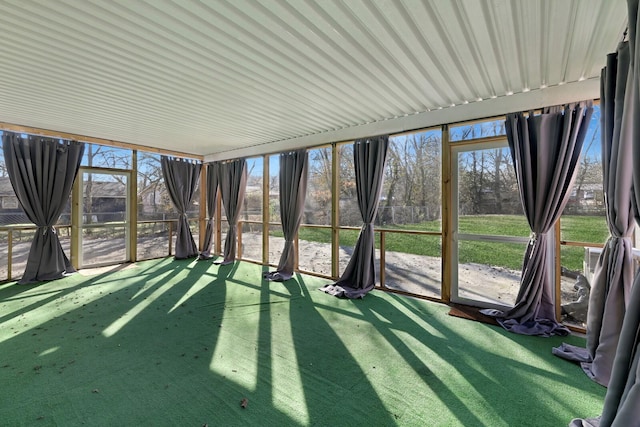 unfurnished sunroom with a healthy amount of sunlight