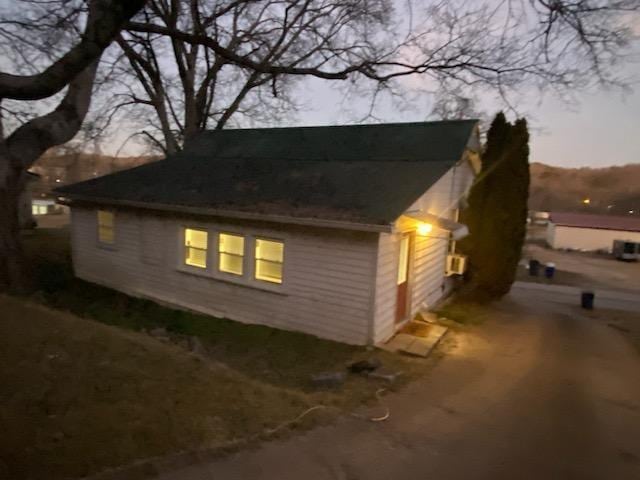 view of property exterior at dusk