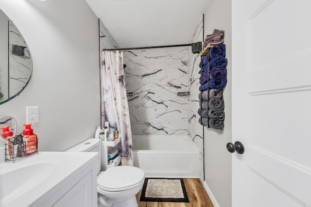 full bathroom with vanity, shower / tub combo, hardwood / wood-style floors, and toilet