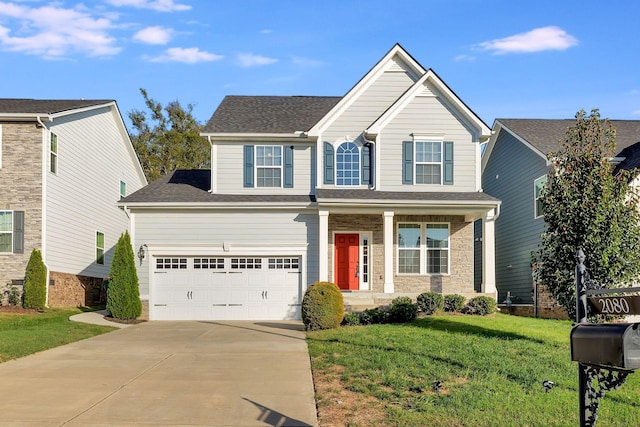 craftsman-style house featuring a front yard