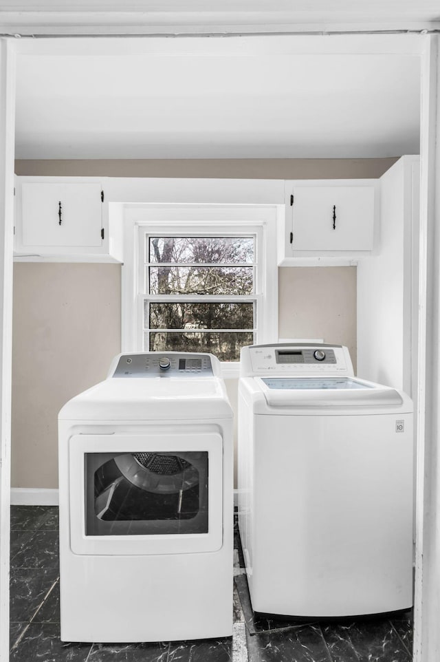 laundry room featuring independent washer and dryer