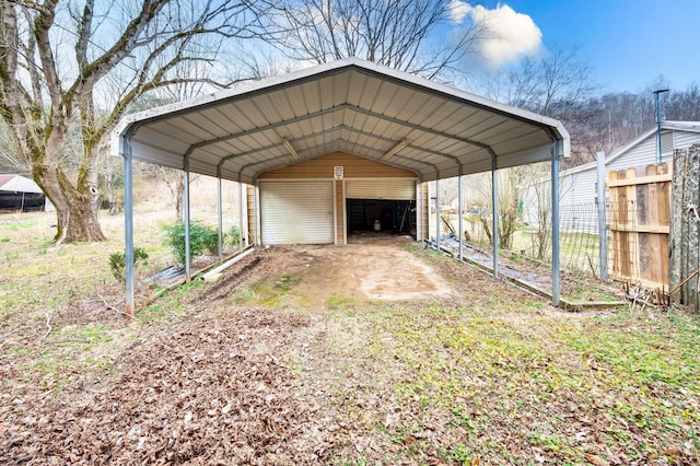 view of parking / parking lot featuring a carport