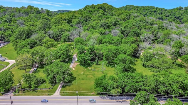 aerial view featuring a view of trees