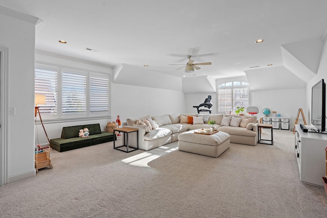 carpeted living room featuring ceiling fan