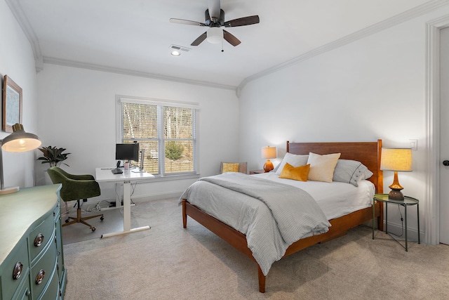 carpeted bedroom featuring ceiling fan and ornamental molding