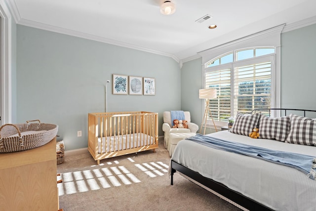 carpeted bedroom with crown molding