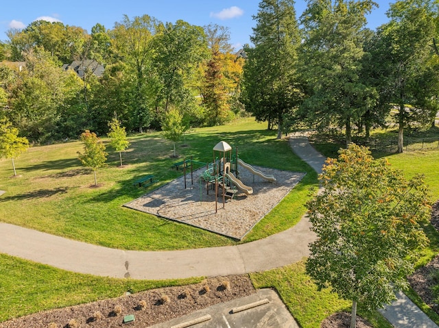 view of community with a yard and a playground