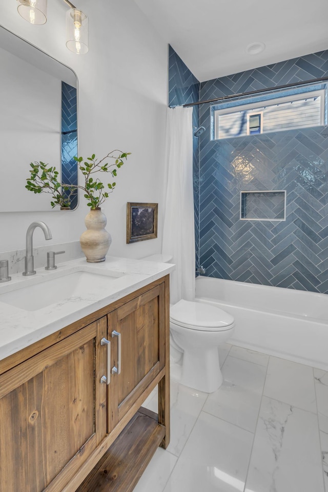 full bathroom featuring vanity, toilet, and shower / bath combo with shower curtain