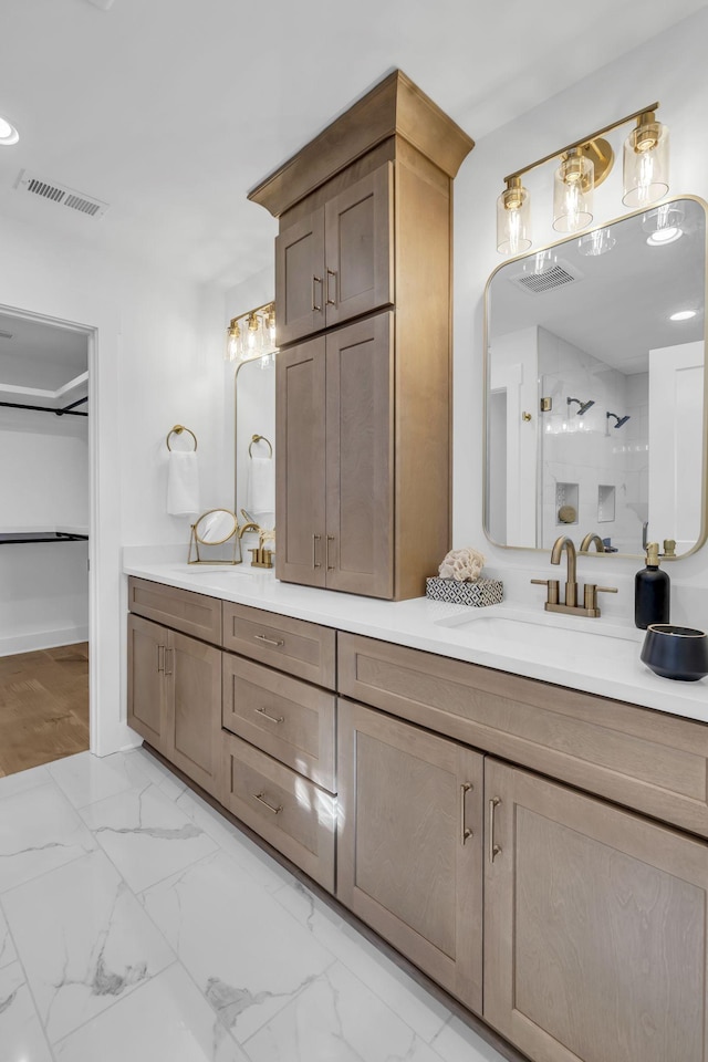 bathroom featuring vanity and walk in shower