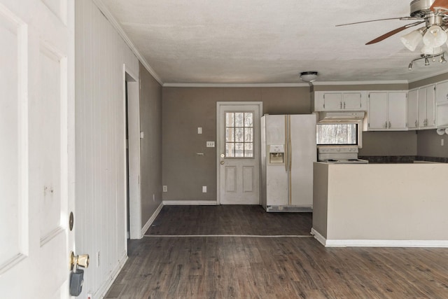 kitchen featuring dark wood-type flooring, ceiling fan, range, ornamental molding, and white fridge with ice dispenser