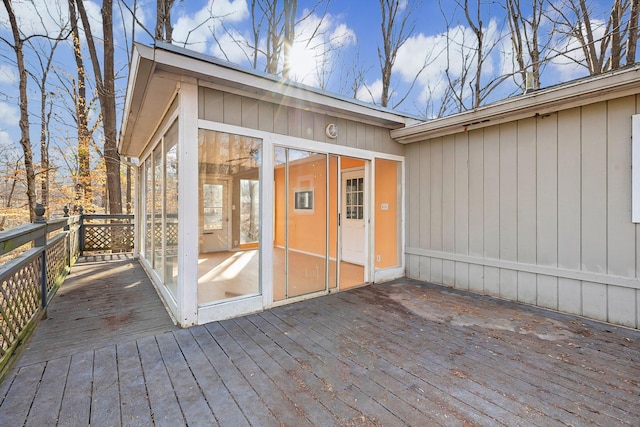 deck with a sunroom