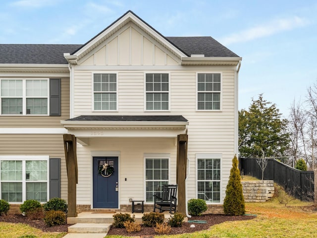 view of front facade with covered porch and a front lawn