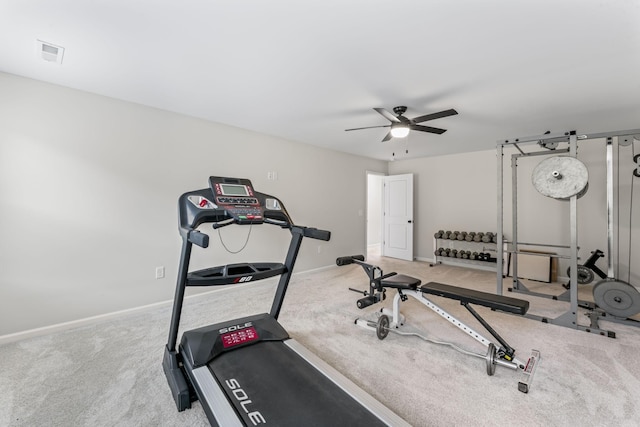 exercise area with light carpet and ceiling fan