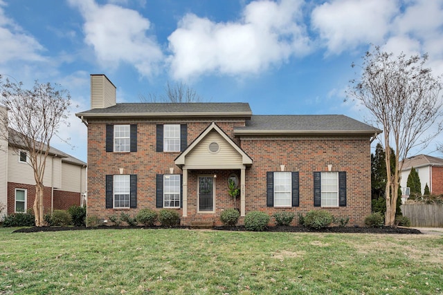 view of front of house with a front yard