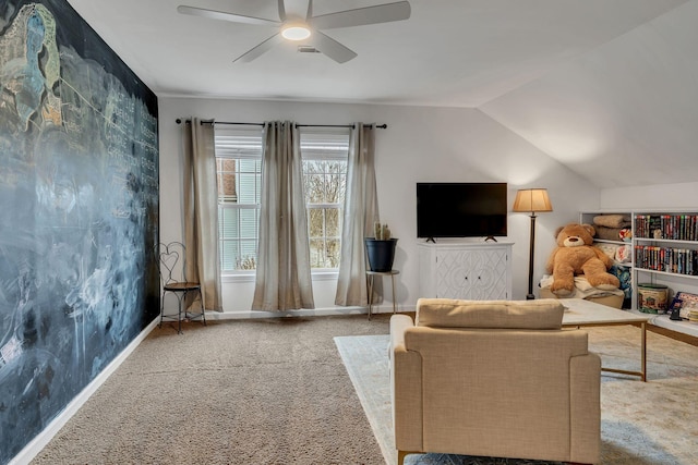 living room with ceiling fan and lofted ceiling