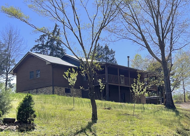198 Brandy Hollow Ln, Portland, TN 37148 - rear view of property with a wooden deck and stone siding