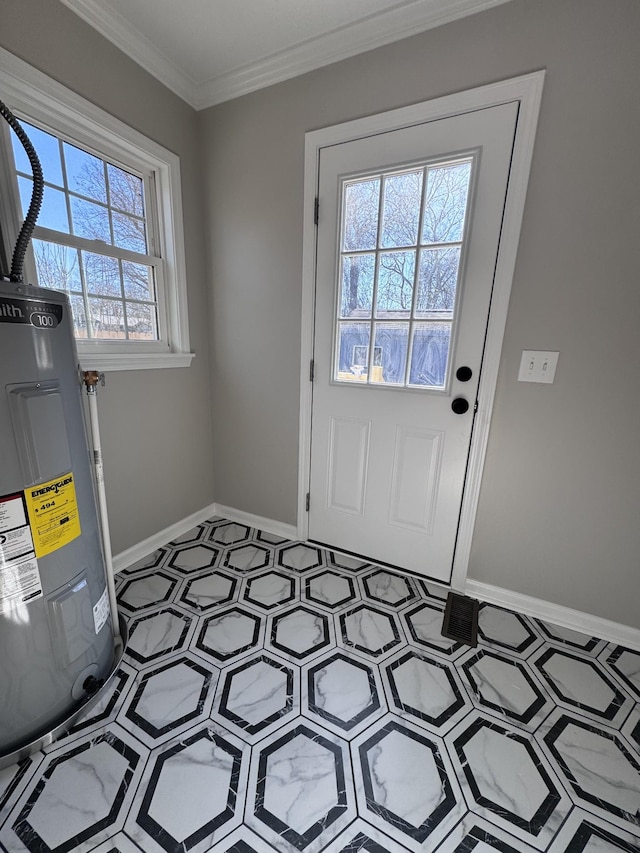 doorway featuring ornamental molding and electric water heater