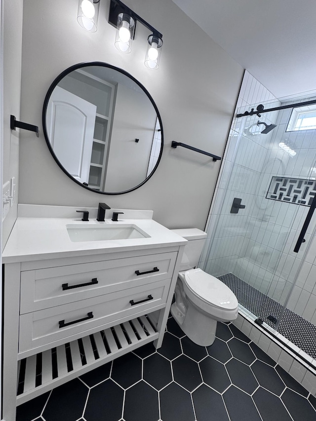 bathroom with walk in shower, vanity, toilet, and tile patterned flooring