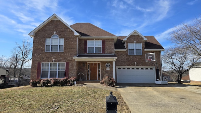 front of property with a garage and a front lawn