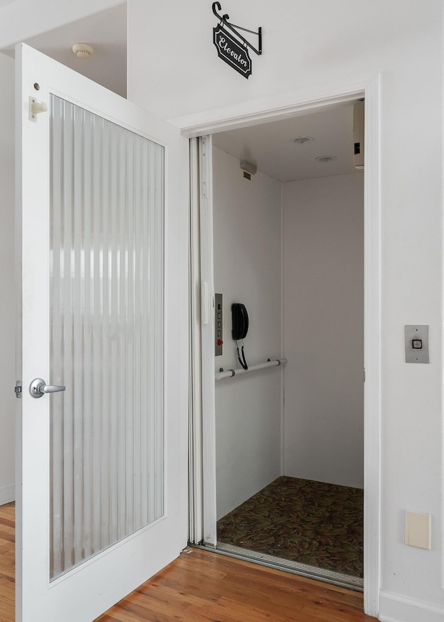 bathroom featuring hardwood / wood-style floors