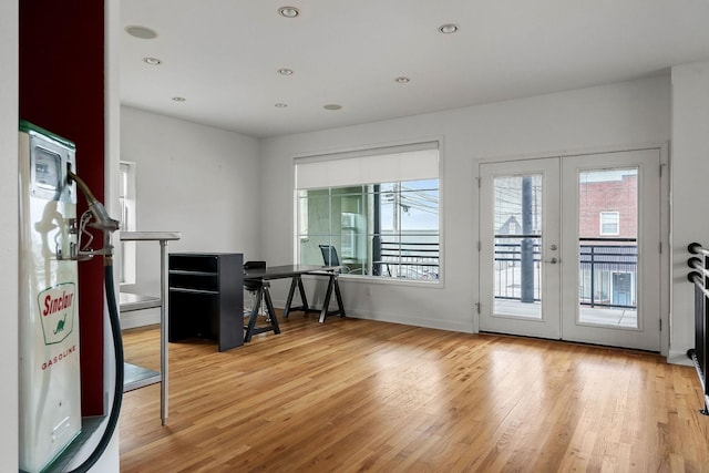 entryway with french doors and wood-type flooring